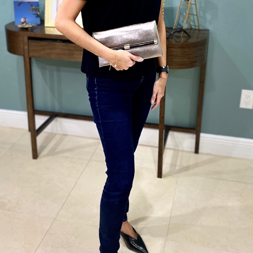 Diane von Furstenberg metallic clutch with tags